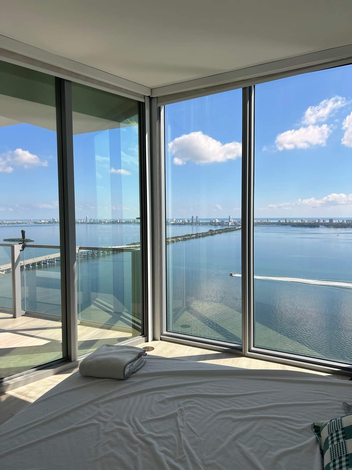 Floor-to-ceiling windows over Biscayne Bay